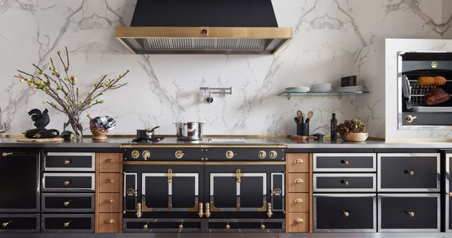 front view of a black and gold la cornue 48" induction range