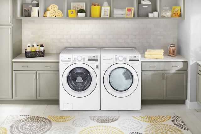 front view of an LG front load washer and dryer in a modern laundry room