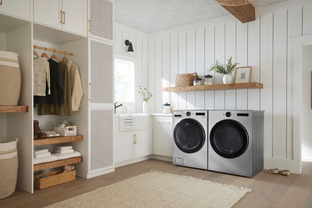 front view of a modern laundry room with an LG front load washer and dryer