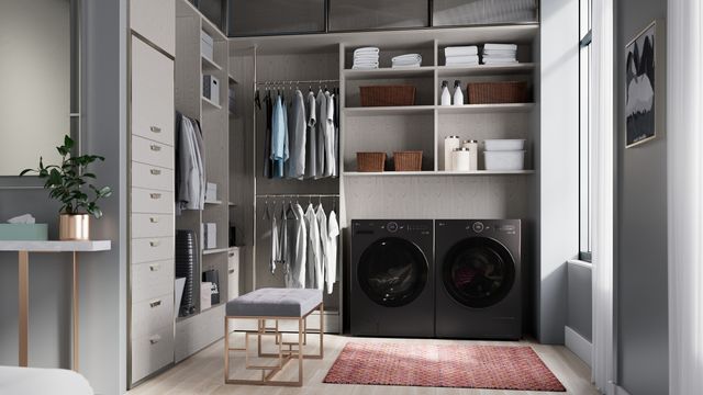 front view of a modern laundry room and closet with an LG front load washer and dryer