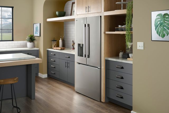 View of a modern kitchen with a counter depth LG french door refrigerator