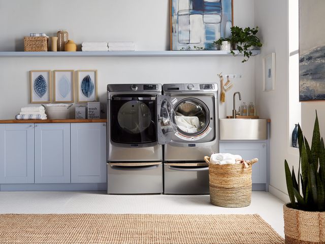 front view of a maytag washer and dryer in a modern laundry room