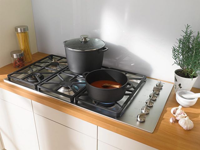 Top view of a modern kitchen with a Miele gas cooktop