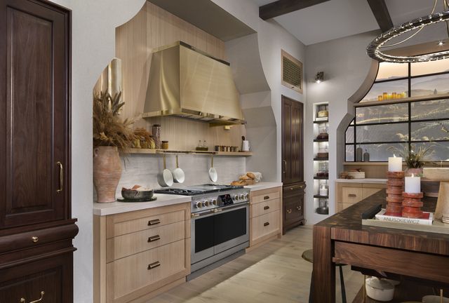 Front view of a luxury kitchen with a 48" Monogram range