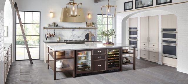 front view of a modern luxury kitchen with monogram appliances