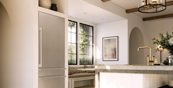 front view of a narrow bottom freezer monogram refrigerator in a modern kitchen