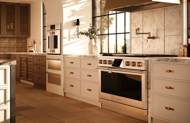 front view of a modern kitchen with Monogram statement appliances