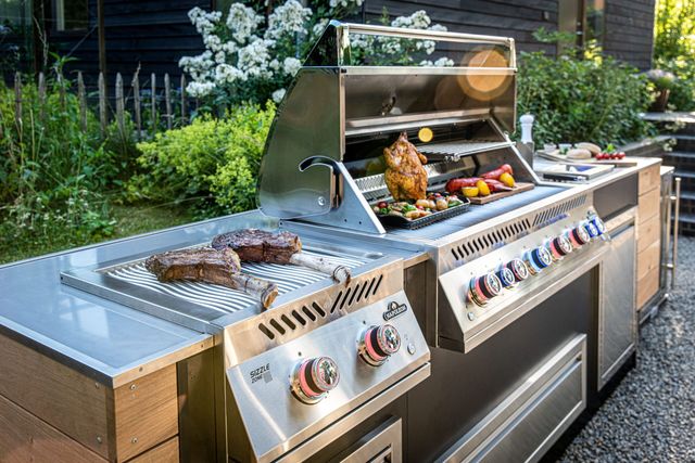 View of food cooking on Napoleon built in outdoor appliances.