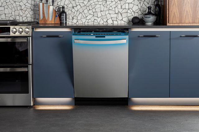 Front view of a slightly opened GE Profile dishwasher