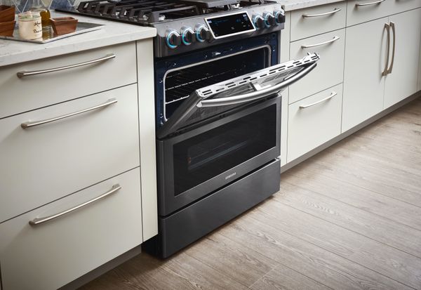 Samsung double oven electric partially open.