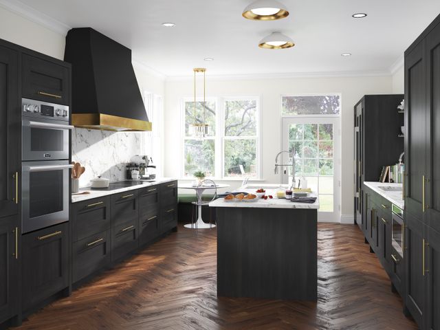 front view of a modern kitchen with Signature Kitchen Suite appliances throughout