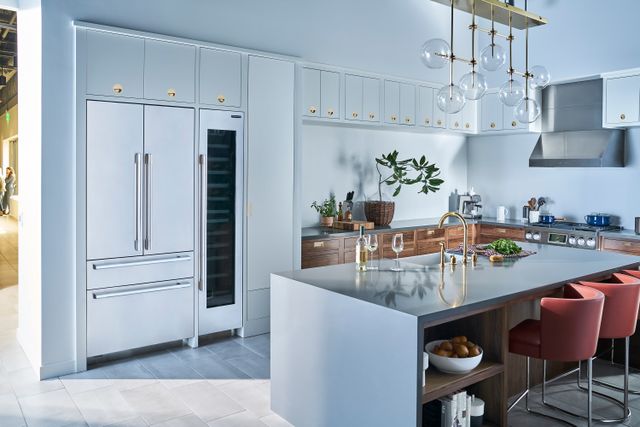 front view of a modern kitchen with stainless steel signature kitchen suite refrigeration
