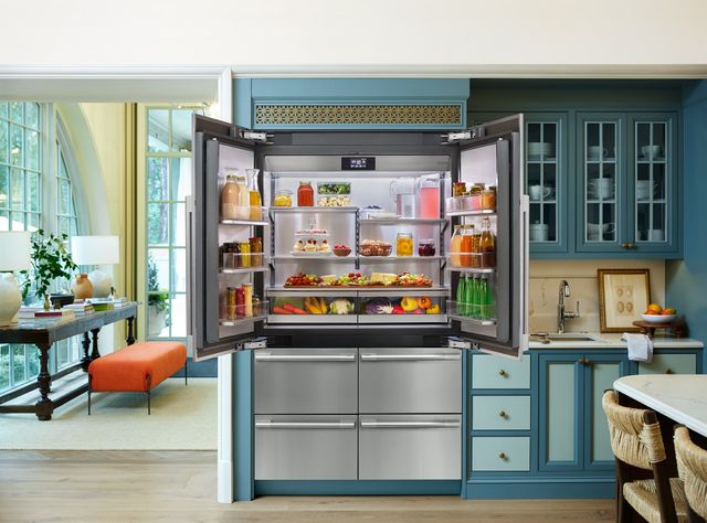 Front view of an opened SKS french door refrigerator in a modern kitchen