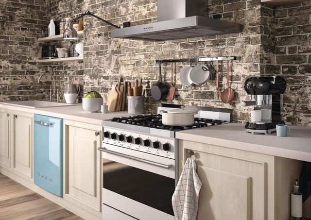 front view of a rustic kitchen with Smeg cooking appliances 