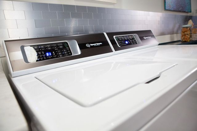 close view of the top and control panel on the speed queen tr7 washer and dryer 