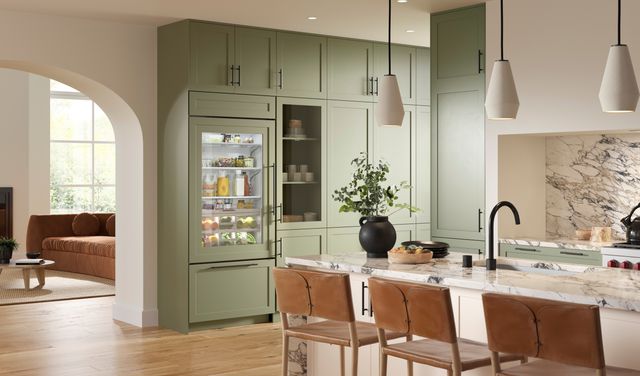 front view of a modern kitchen with a panel ready Sub-Zero built in refrigerator