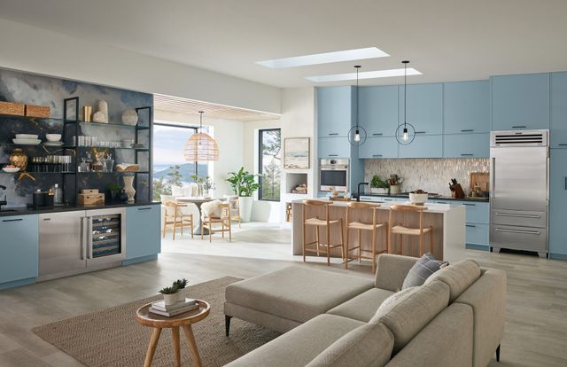 front view of a luxury kitchen and living room with sub-zero appliances 