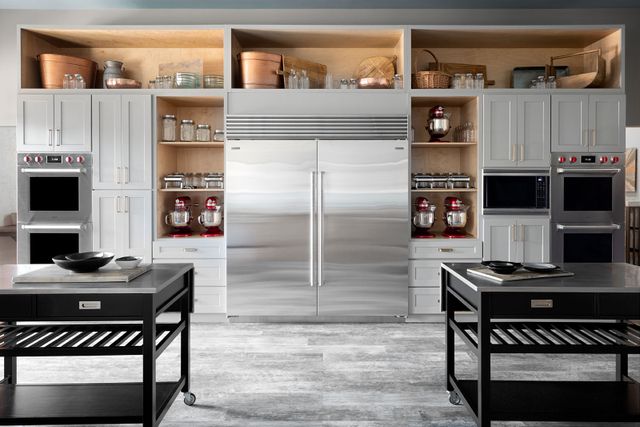 Front view of two large counter depth Sub-Zero refrigerators
