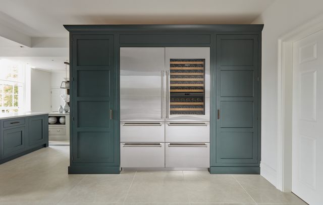Front view of a modern kitchen with two Sub-Zero cabinet depth refrigerators