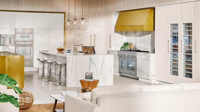 Front view of a large luxury kitchen with Thermador appliances