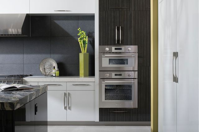 front view of a Thermador electric wall oven and steam oven in a modern kitchen