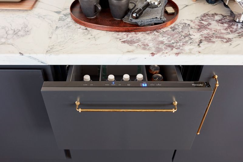 Dark panel refrigerator drawer ajar