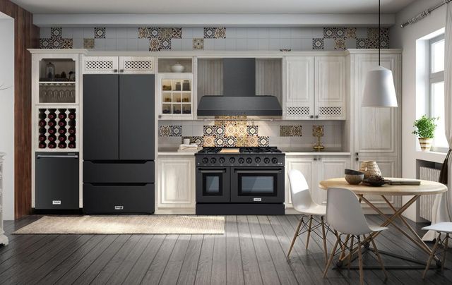 Front view of a modern kitchen with dark grey Thor appliances.