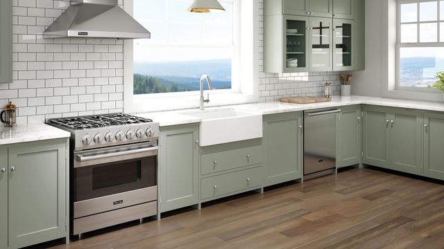 Front view of a freestanding Viking stainless steel range in a modern kitchen
