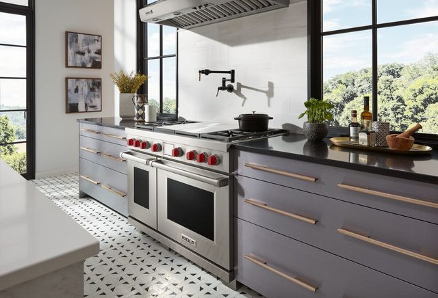view of a modern kitchen with kitchen with a Wolf dual fuel range