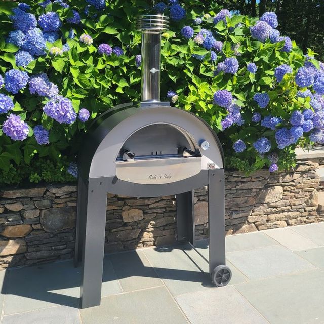 Front view of a freestanding XO pizza oven 
