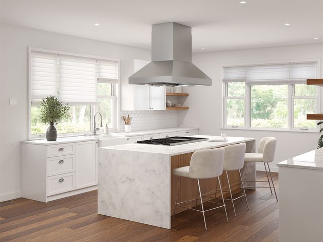 front view of a moder white kitchen with a stove built in on one side and seating on the other