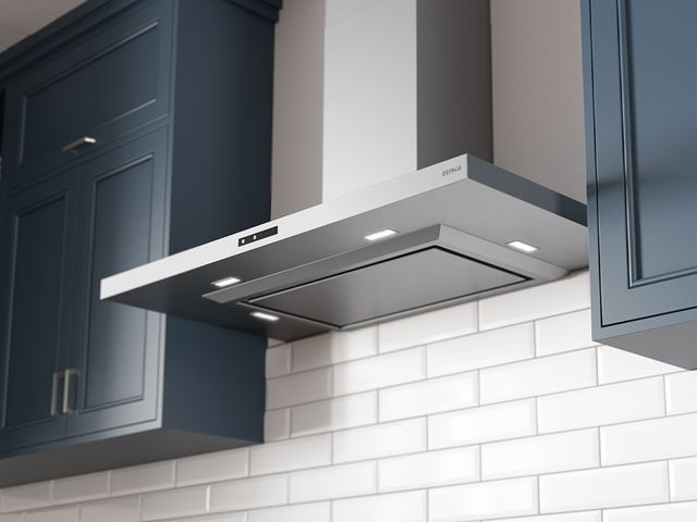 Front view of a Zephyr range hood in a modern kitchen