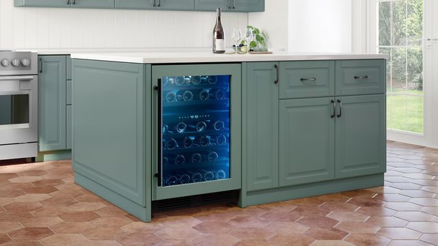 Credit: Zephyr Front view of a modern kitchen with an island with a wine fridge