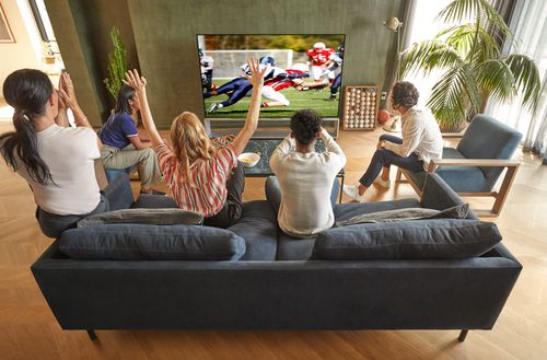 Friends Watching Game on OLED TV