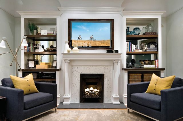 front view of a small living room with two chairs around it