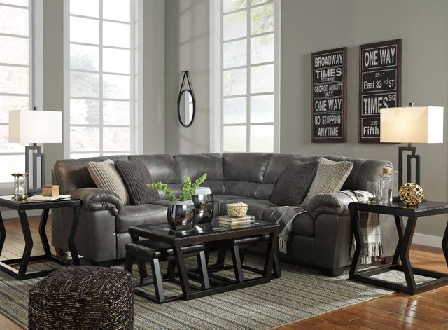 front view of a modern living room with signature design by ashley furniture