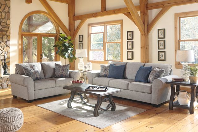front view of an ashley furniture sofa and loveseat in a farmhouse style living room