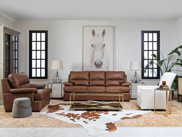 Front view of a modern living room with a matching living room furniture set and table set