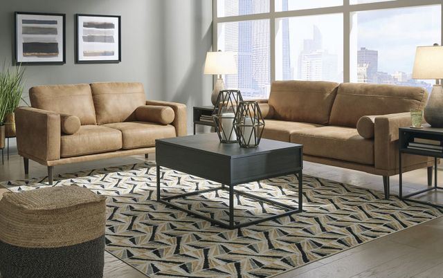Credit: Signature Design by Ashley Front view of a modern living room with a mid-century modern sofa set