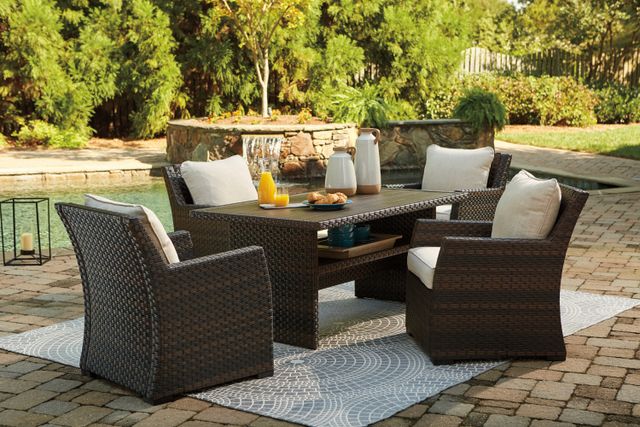 Front view of a modern outdoor conversation set from Ashley furniture