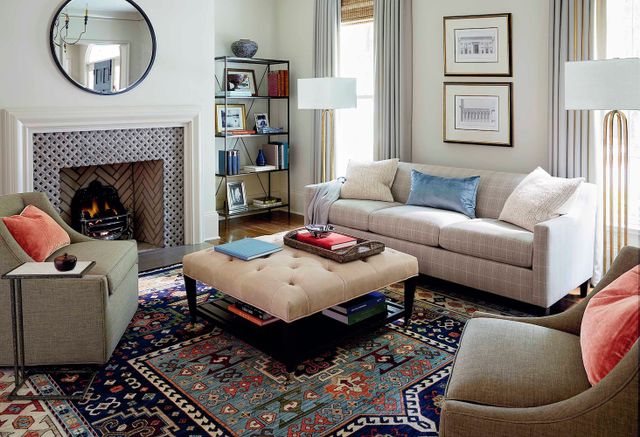 Front view of a modern living room with mix-matched furniture 
