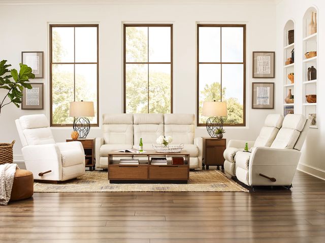 front view of a beige living room with a la-z-boy sofa, chair, and loveseat 