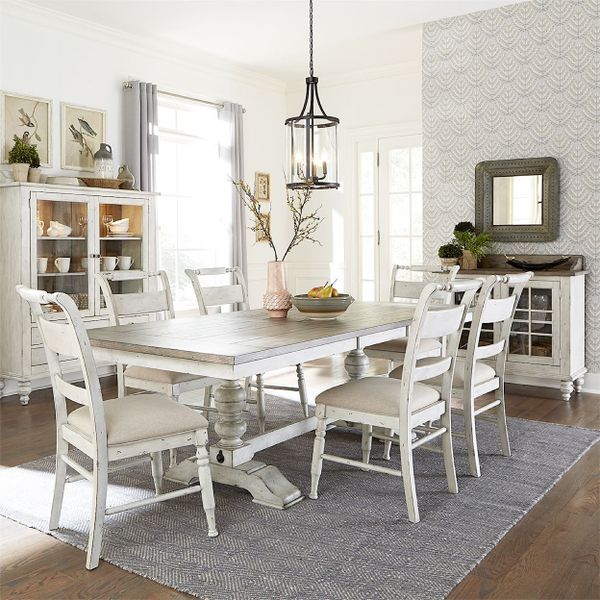 front view of a modern farmhouse style dining room with whitewasher liberty furniture including a rectangle table, six matching chairs, and a matching china cabinet and sideboard