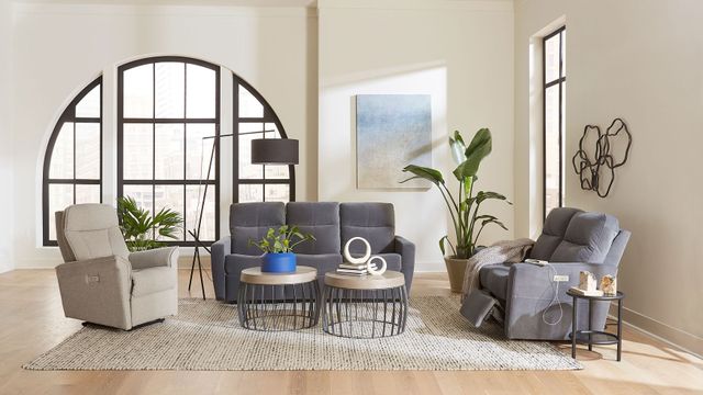 Front view of a modern living room with a matching sofa and recliner and accent recliner