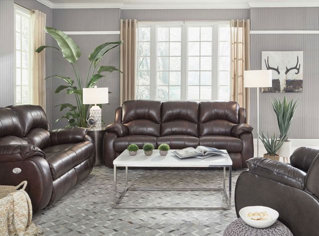front view of a modern living room with brown leather power reclining sofas