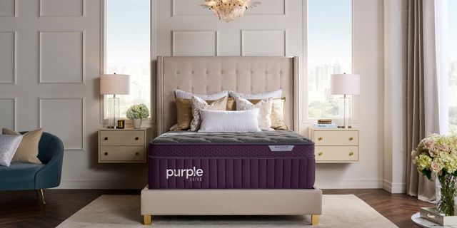 Front view of a modern bedroom with a Purple mattress
