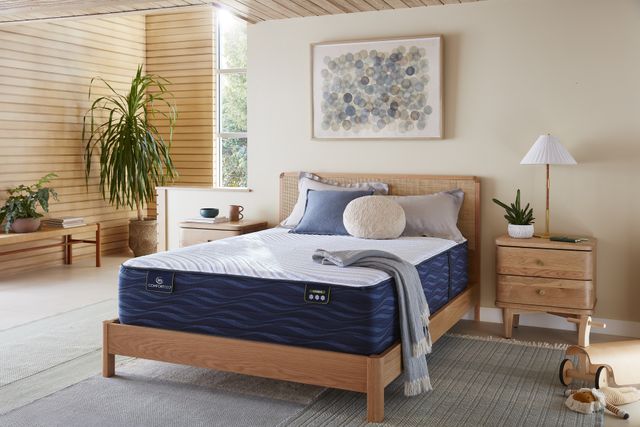 front view of a Serta mattress in a modern bedroom