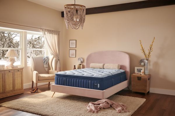 Plush pillowtop mattress on a mid-century style bedframe