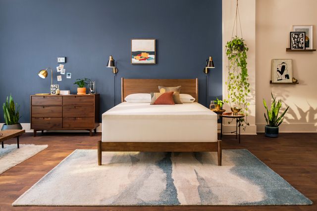 Front view of a modern bedroom with a platform bed and Tempur-Pedic mattress
