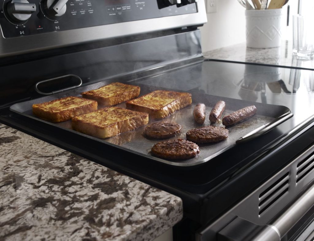 Cuisinière avec élément pont